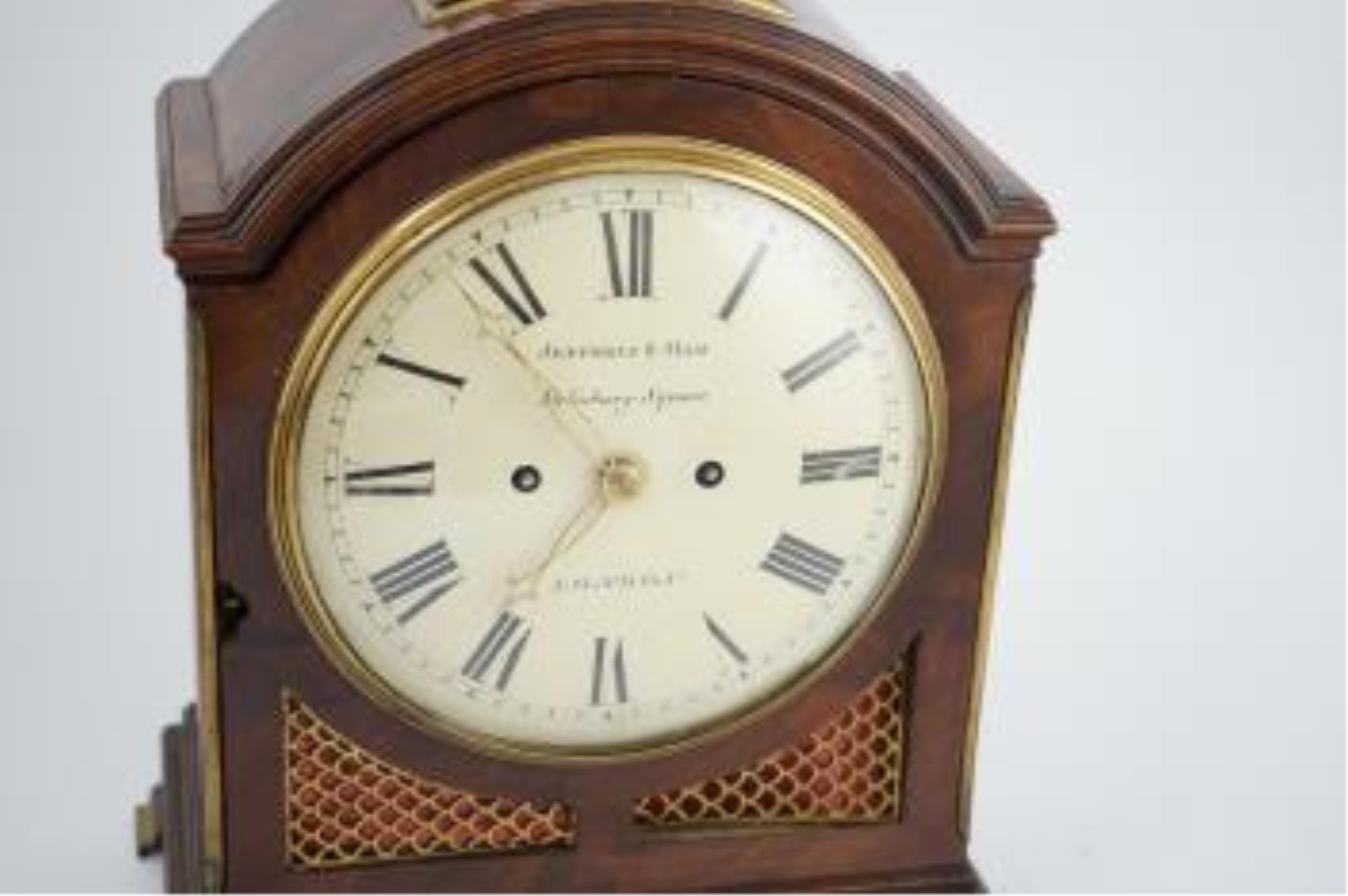 Jefferys & Ham, Salisbury Square, London. A George III eight day repeating bracket clock in arched mahogany case with painted signed Roman dial and twin fusee movement, with anchor escapement and ornately engraved backpl